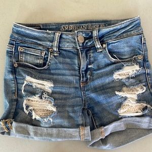 American Eagle denim shorts lace pockets size 4